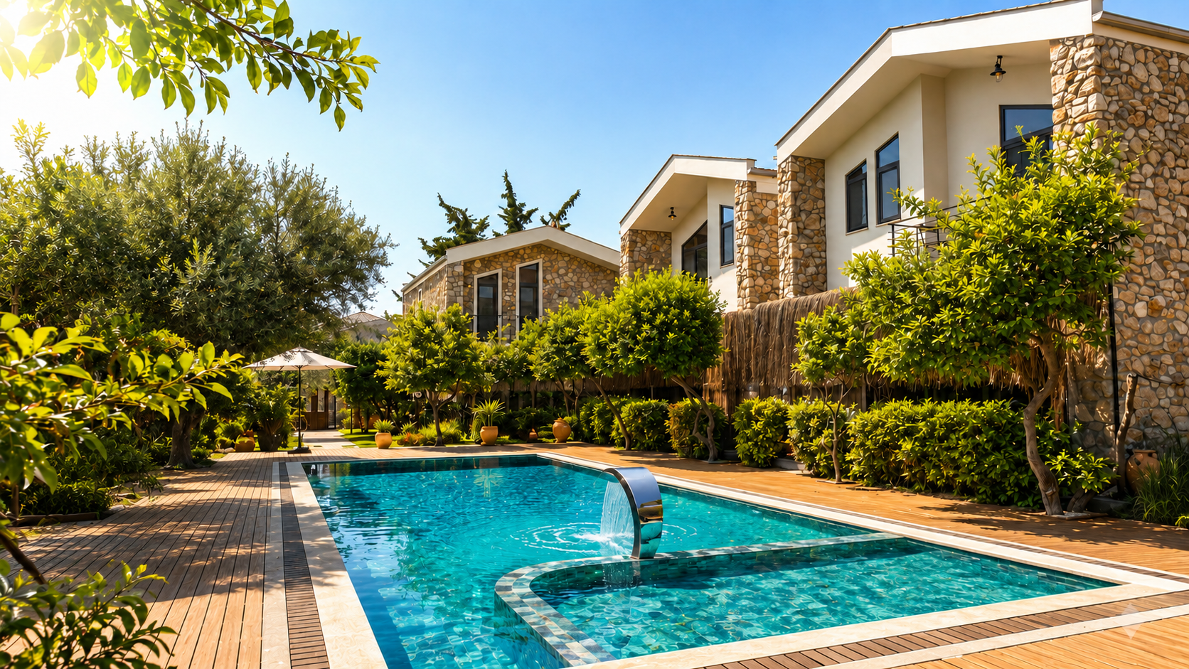 Portakal Suites Datça ortak havuzu, bahçesi ve daireleri